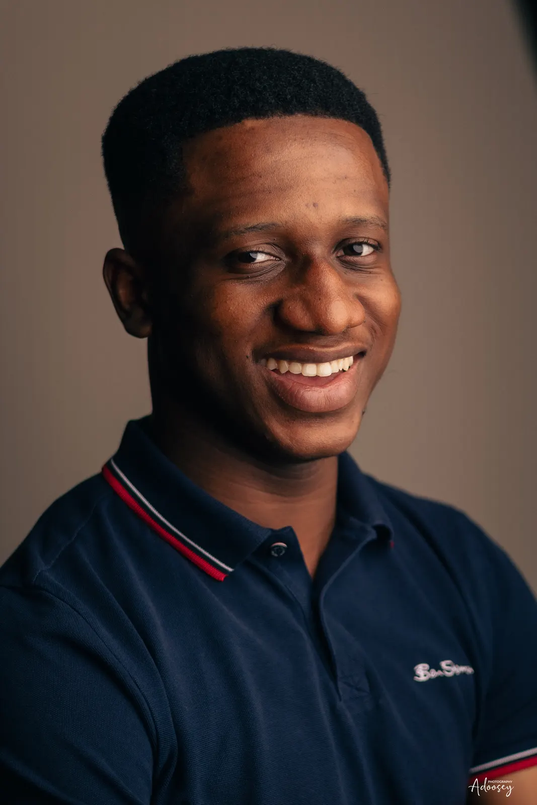 Portrait of Joel Adu-Kwarteng, smiling